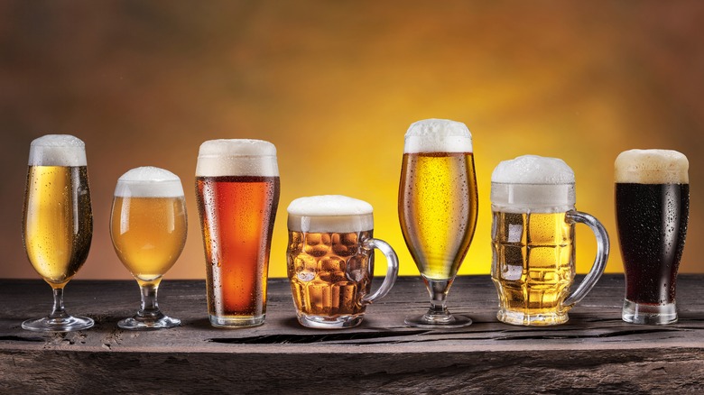 seven full beer glasses