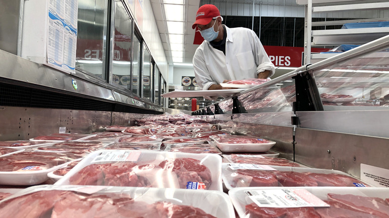 stocking steaks at Costco