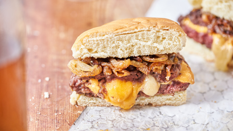 cheese melting out of burger