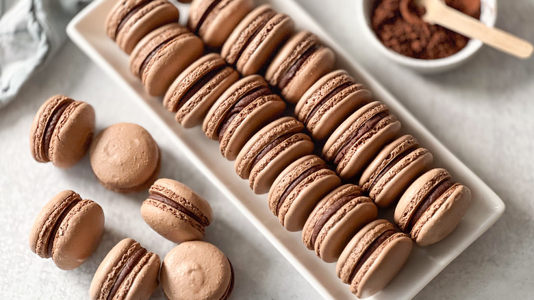 Chocolate macarons on serving platter