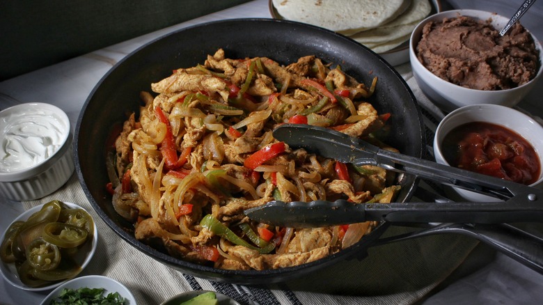 skillet of chicken fajitas