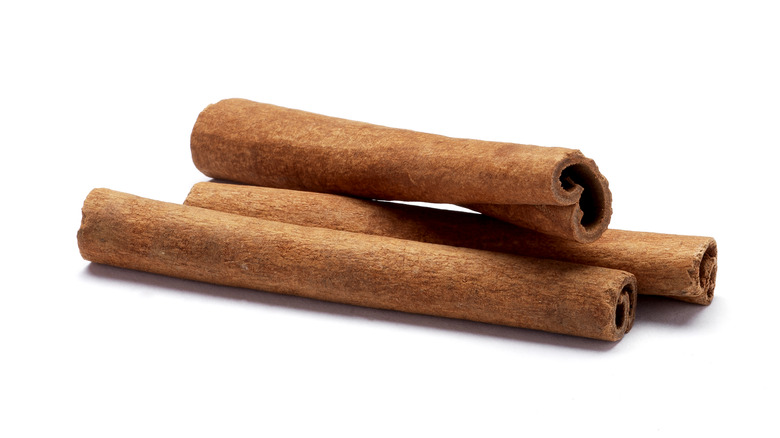 Cinnamon sticks on white background