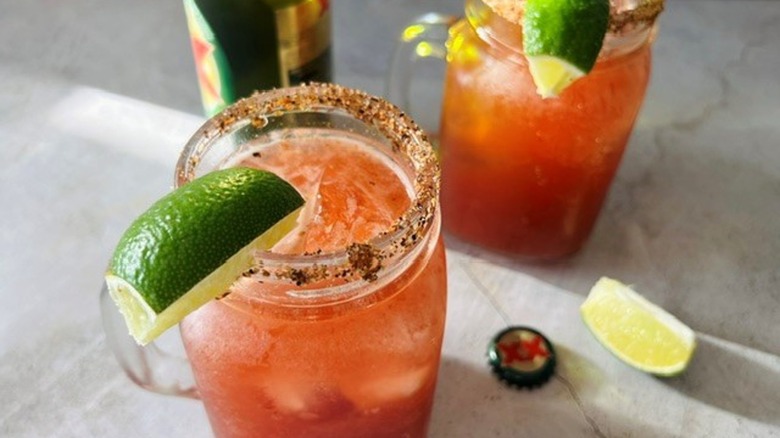 micheladas with lime wedges