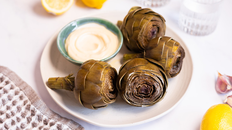 steamed artichokes on plate 