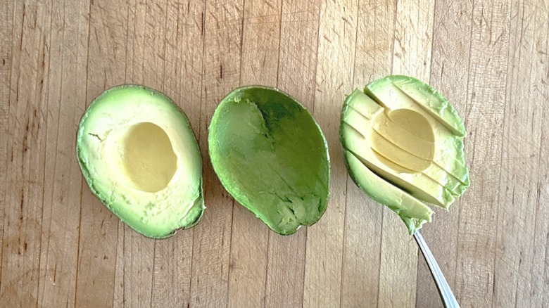 Ripe avocado cut and sliced