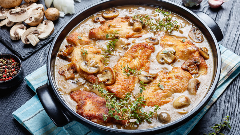 chicken marsala with mushrooms in pan