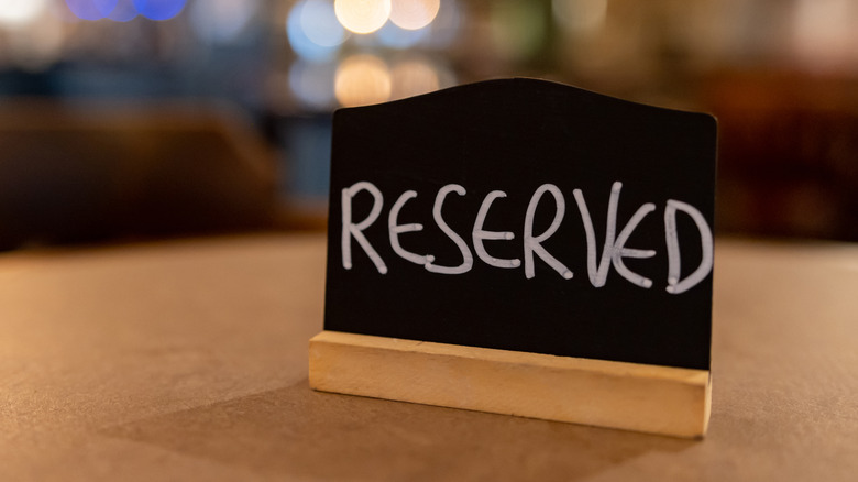 Reserved sign on restaurant table