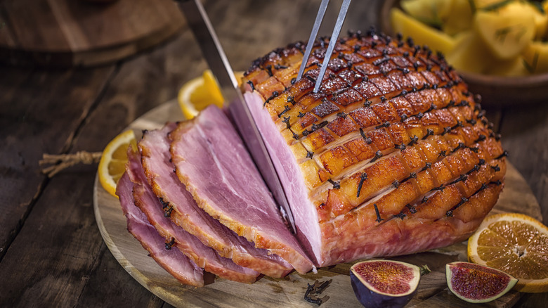 Ham being sliced