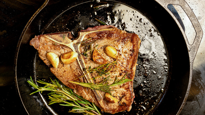 T-bone steak in a skillet