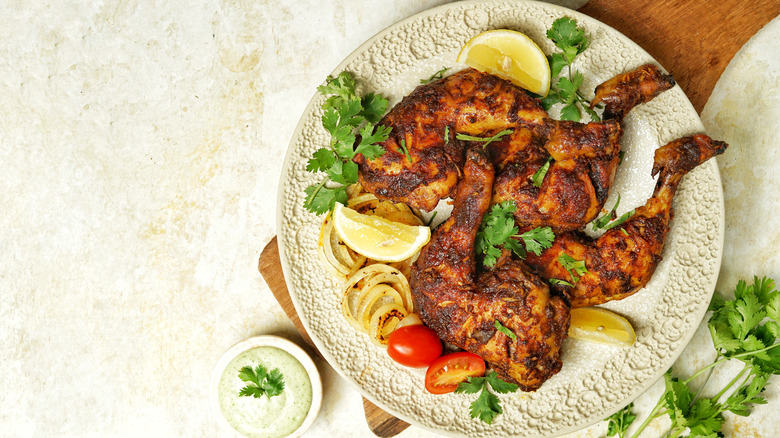 plated spiced chicken thighs