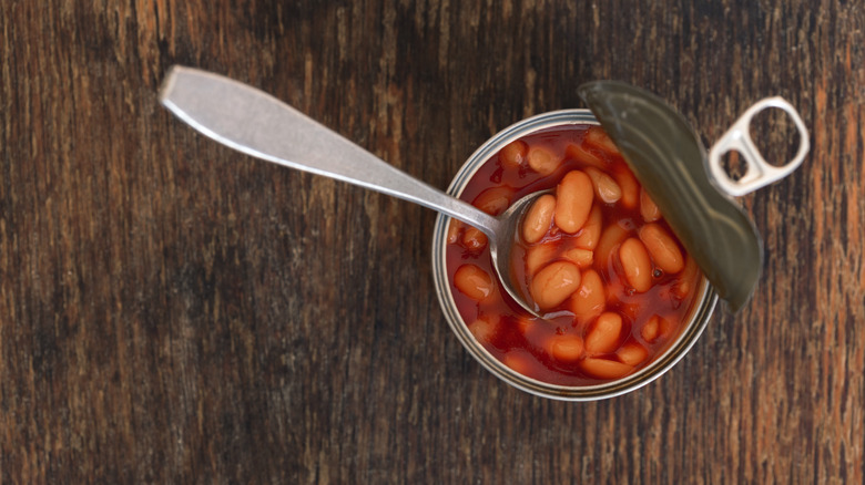 Can of beans on table