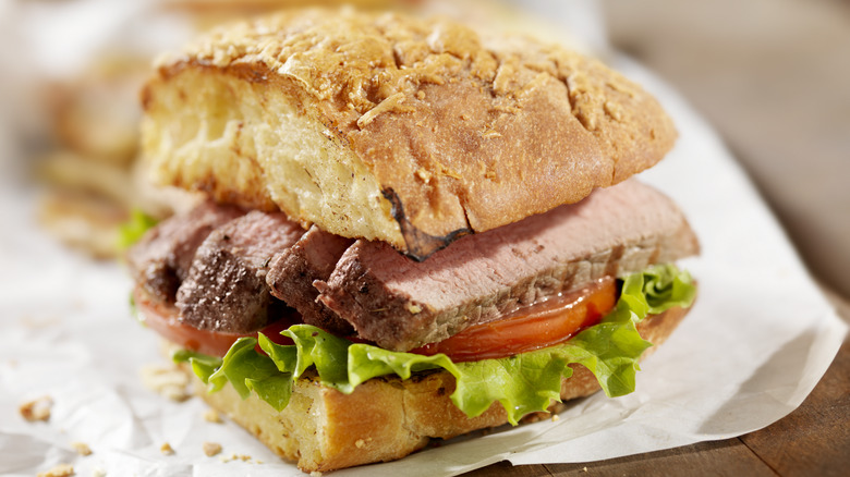 Steak sandwich with lettuce tomatoes