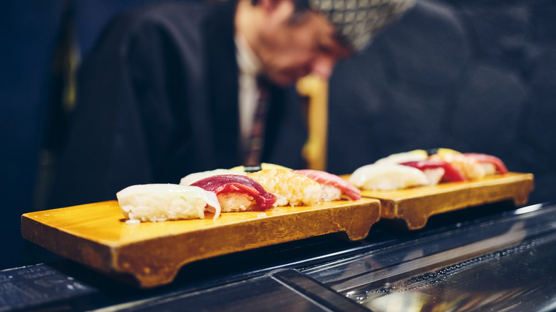 Sushi assortment on wooden boards