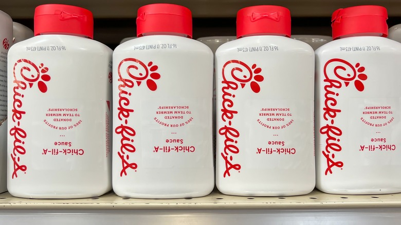 Chick-fil-A sauce bottles on shelf