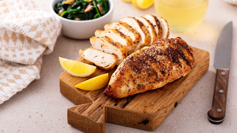 Chicken breast on cutting board