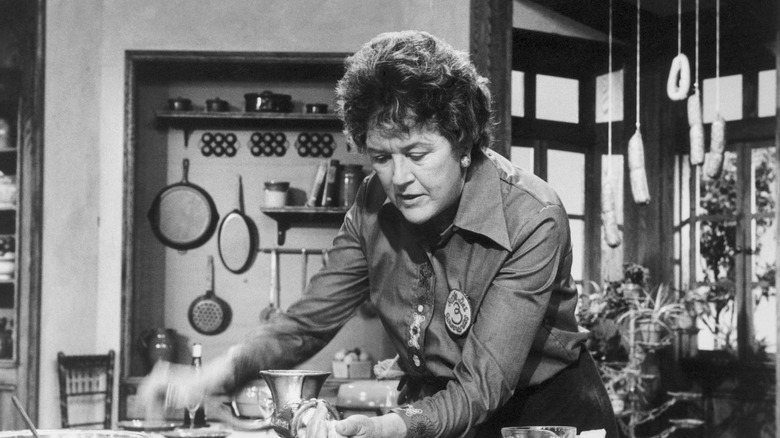 Julia Child preparing sausage