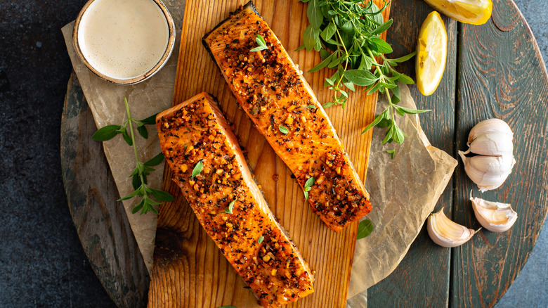 Salmon fillets on cedar plank