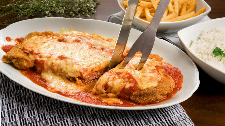 Parmesan-crusted steak on plate