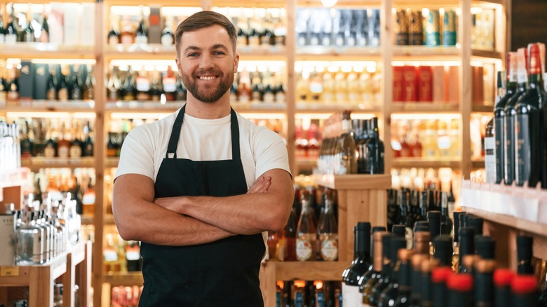 wine shop and smiling owner