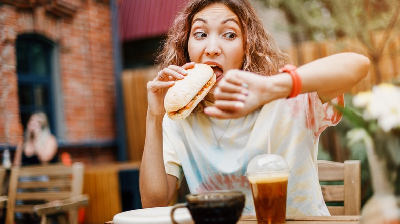 Person eating in hurry