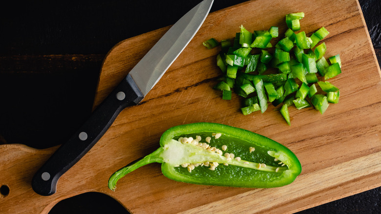 paring knife with sliced jalapeno