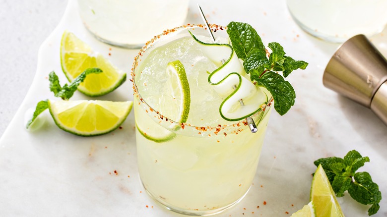 Margarita with cucumber and mint garnish