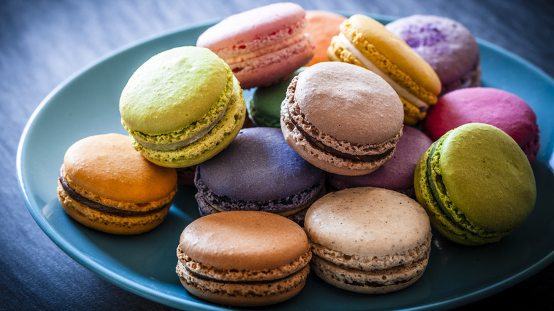 Colorful macarons on plate