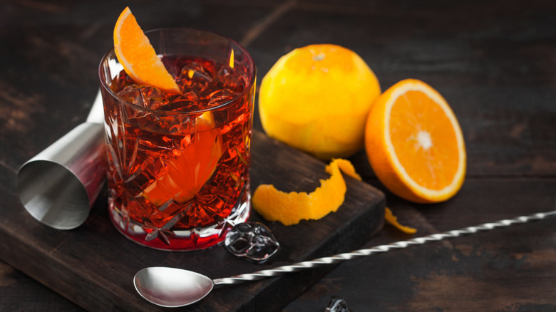 Negroni cocktail citrus and spoon