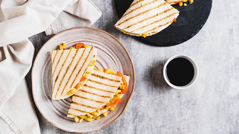 quesadillas and coffee on table