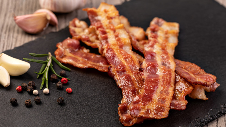 Strips of bacon on slate