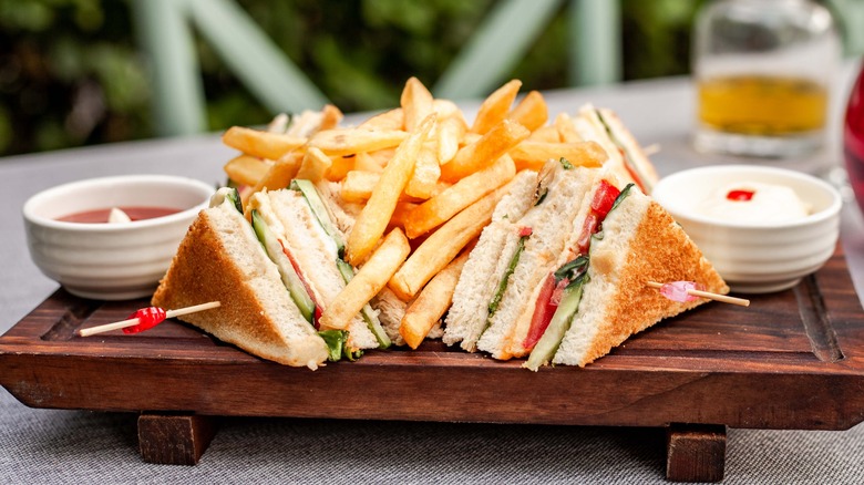 Club sandwiches and fries.