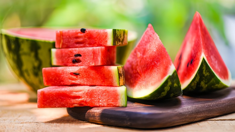 Sliced watermelon on cutting board