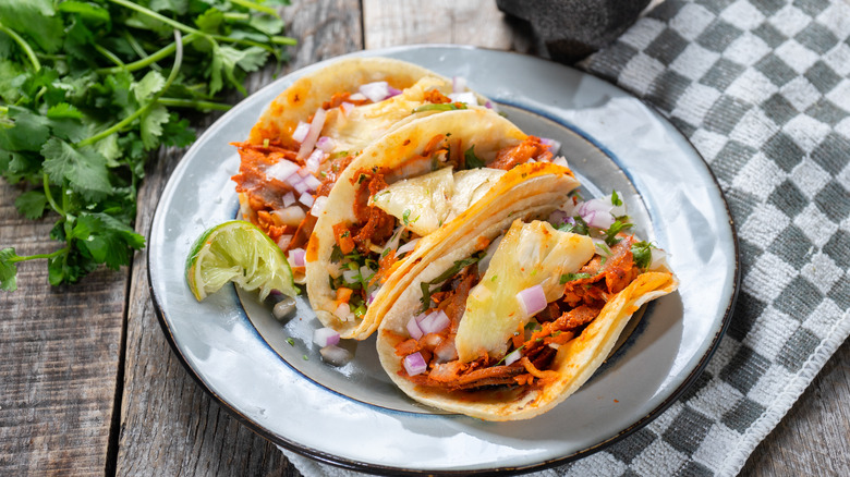 Tacos al pastor on plate