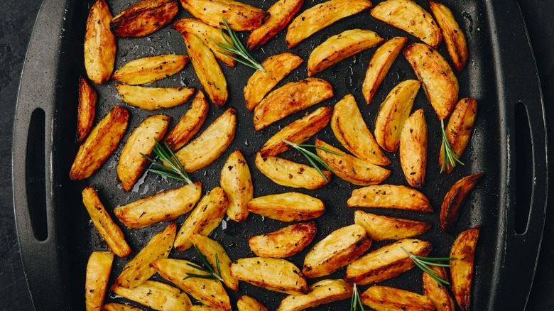 steak fries on a baking pan