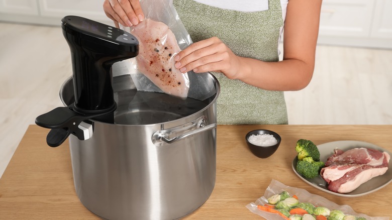 Putting meat into sous vide cooker