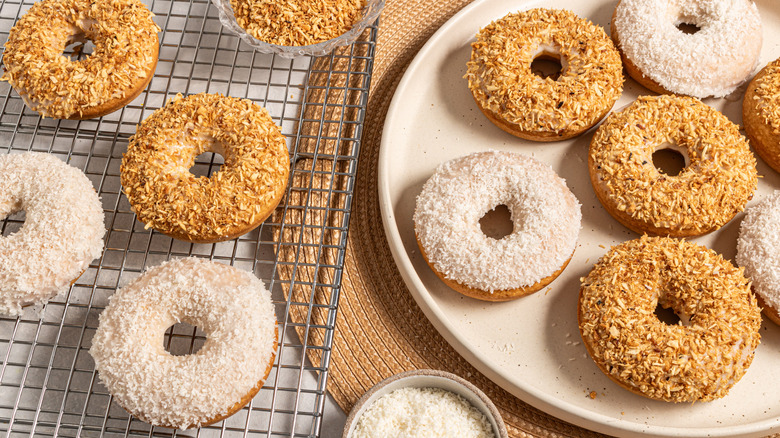 Donuts on a wire rack and a plate