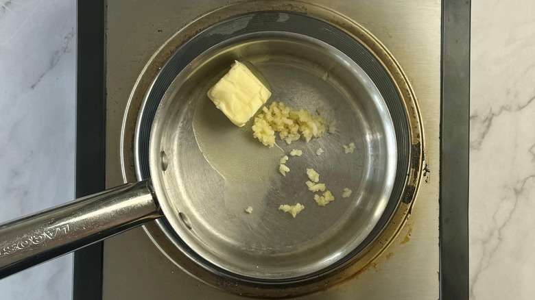 butter and garlic in pan