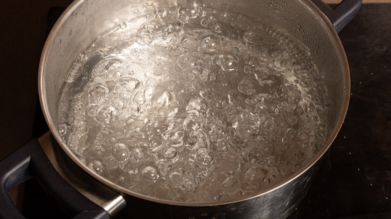 water boiling in metal pot