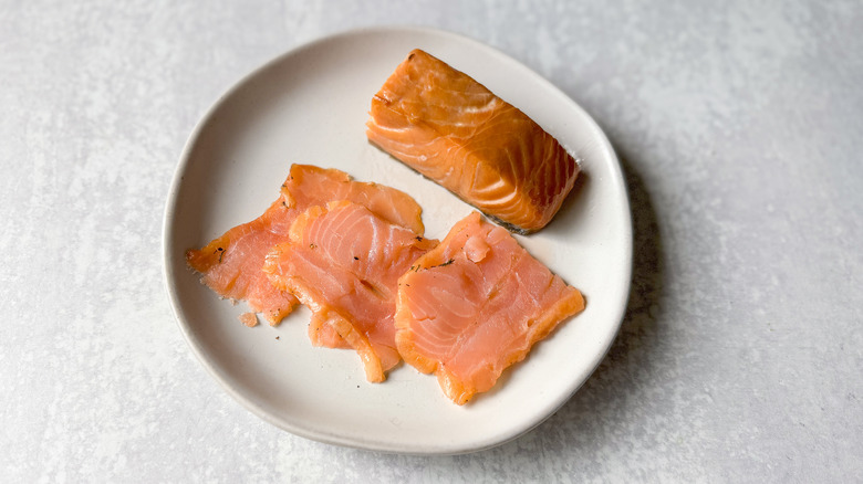 Hot and cold smoked salmon on plate