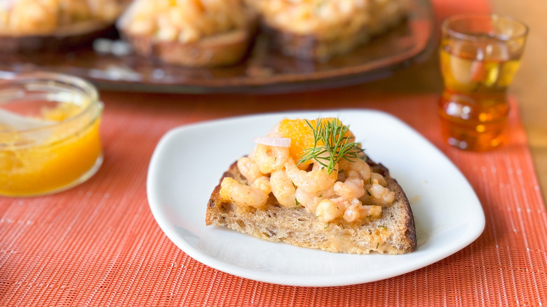 Shrimp salad toast Skagen on plate